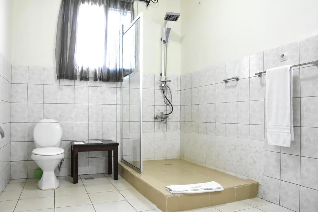 One Click Hotel Kigali Bagian luar foto